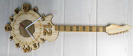 pendule en bois motif guitare style design music musical style fabrication artisanale fabriqué en Haute Savoie par Thim Montagn'art