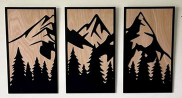 Triptyque représentant une montagne découpe laser, artisanat savoyard réalisé par Thim Montagn'Art entreprise située à Serraval Haute Savoie