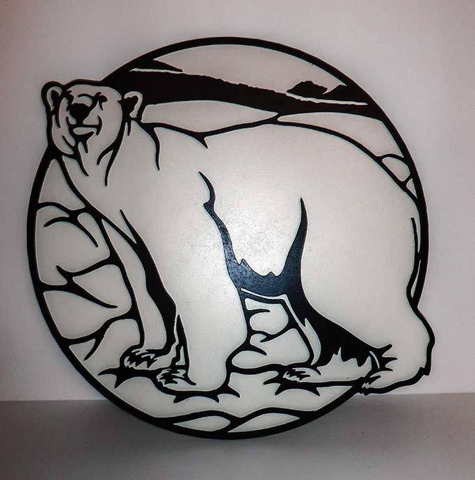 Grizzli découpé au laser objet décoration de fabrication française réalisé par Thim Montagn'Art artisan à Thônes Serraval. 